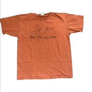 Vintage Funny Mans First Video Game T-Shirt Rust Color Size L.